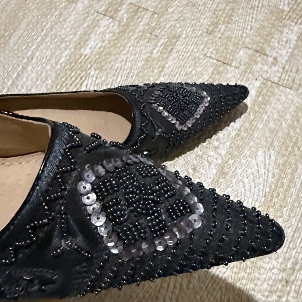 Brand new leather like beaded heels